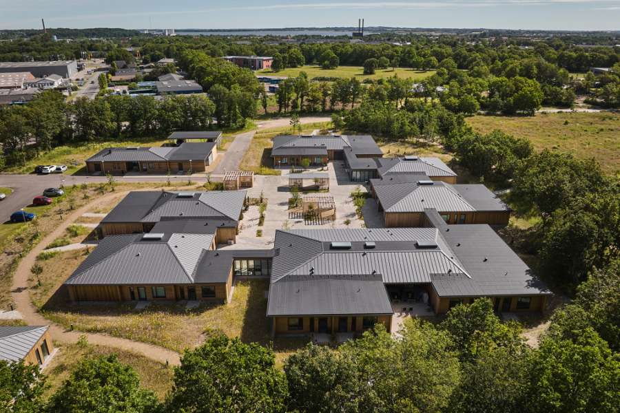 Homes and facilities for autistic residents, clad in wood and steel profiles, and surrounded by forest, AutismeCenter Skive, Jægervej 16, 7800 Skive